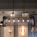 Люстра подвесная овальной формы с металлическим решетчатым абажуром матово-черного цвета и 5 лампами Kichler варинант исполнения - 7 | Loft Concept в Сочи